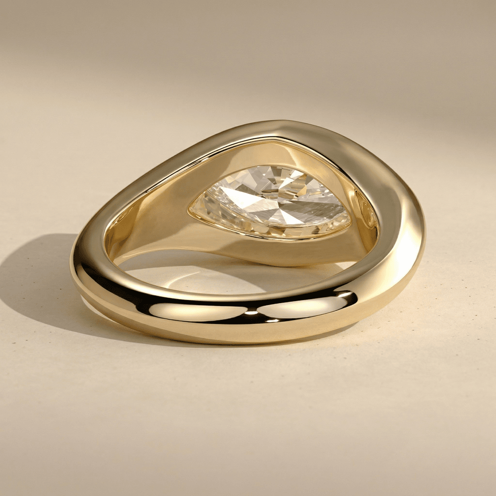 Bezel set marquise moissanite ring back side view
