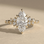 Solid gold marquise moissanite wedding ring with cluster setting