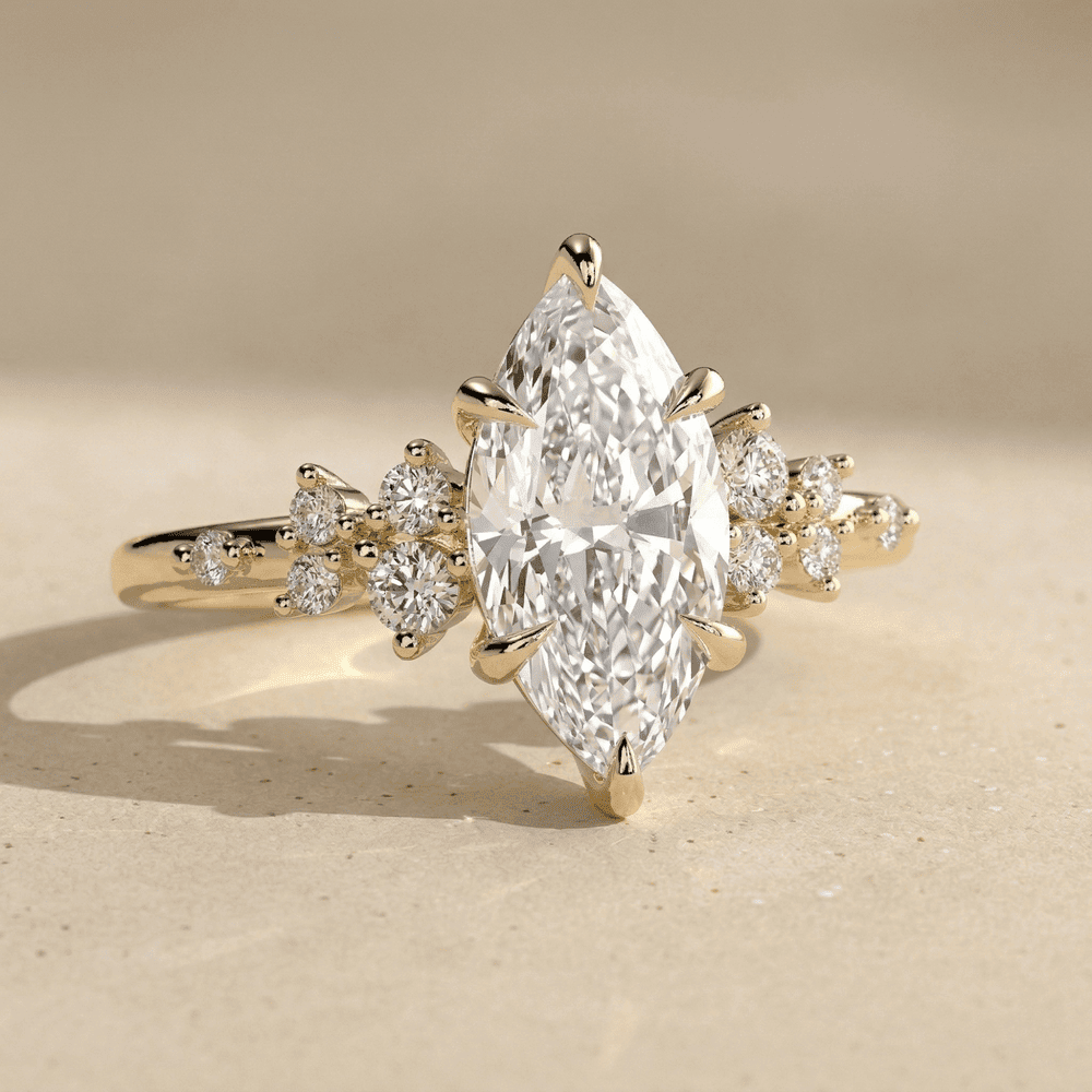 Elegant marquise moissanite cluster engagement ring in solid gold