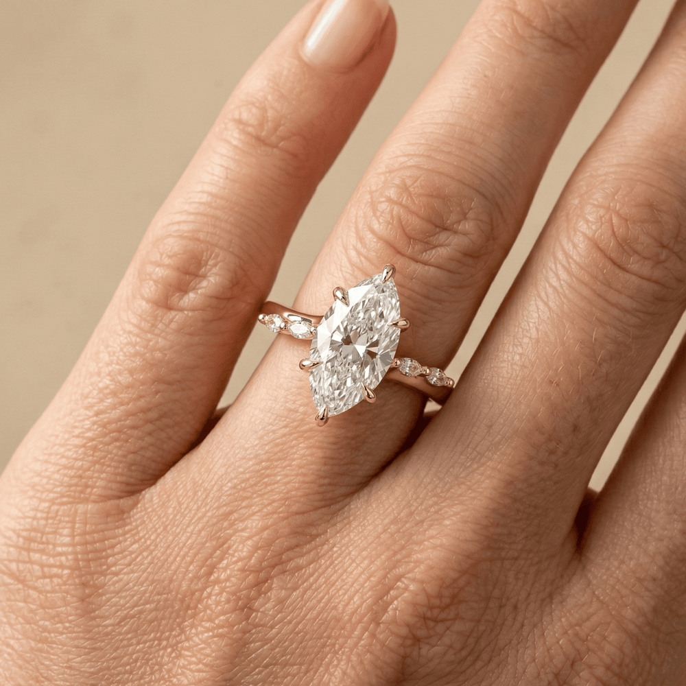 Marquise cut moissanite ring in yellow gold close up