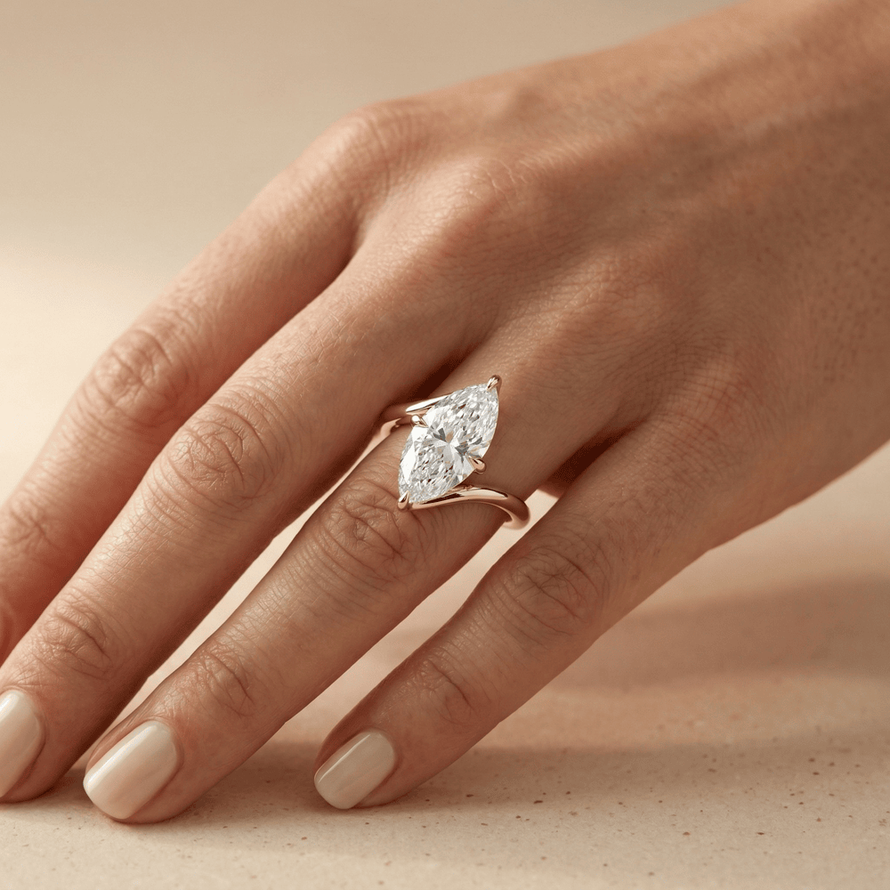 Modern marquise solitaire engagement ring for her
