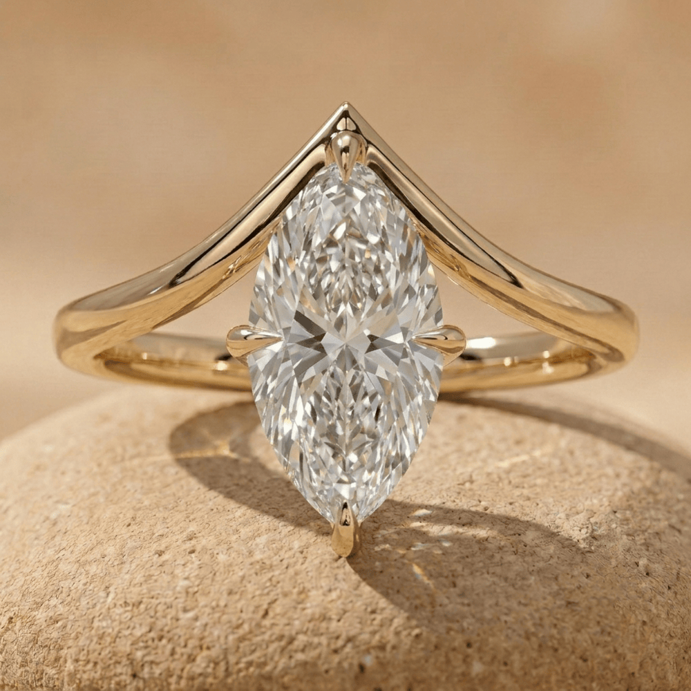 Marquise moissanite curved engagement ring in 14K gold