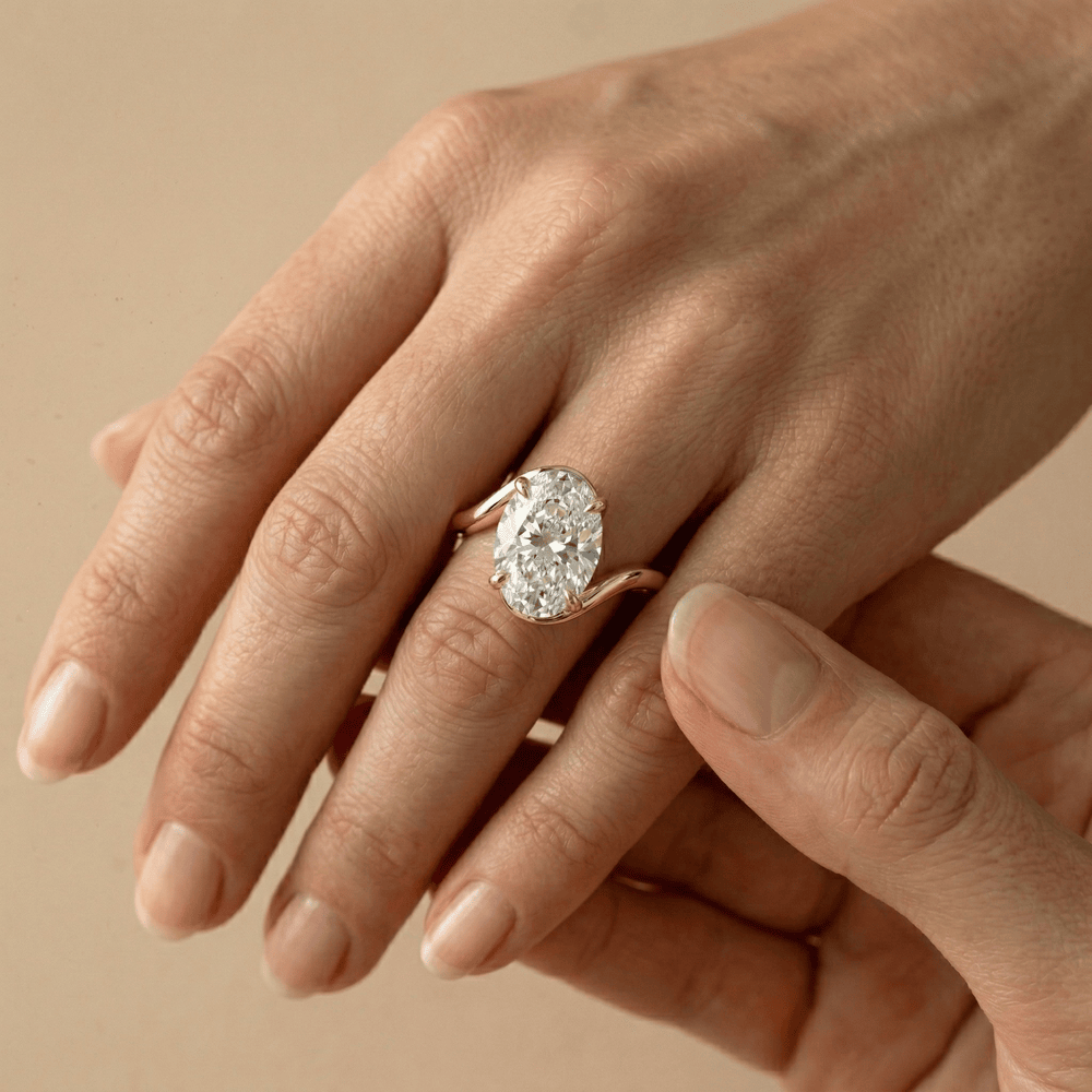 Unique bypass band engagement ring with oval moissanite
