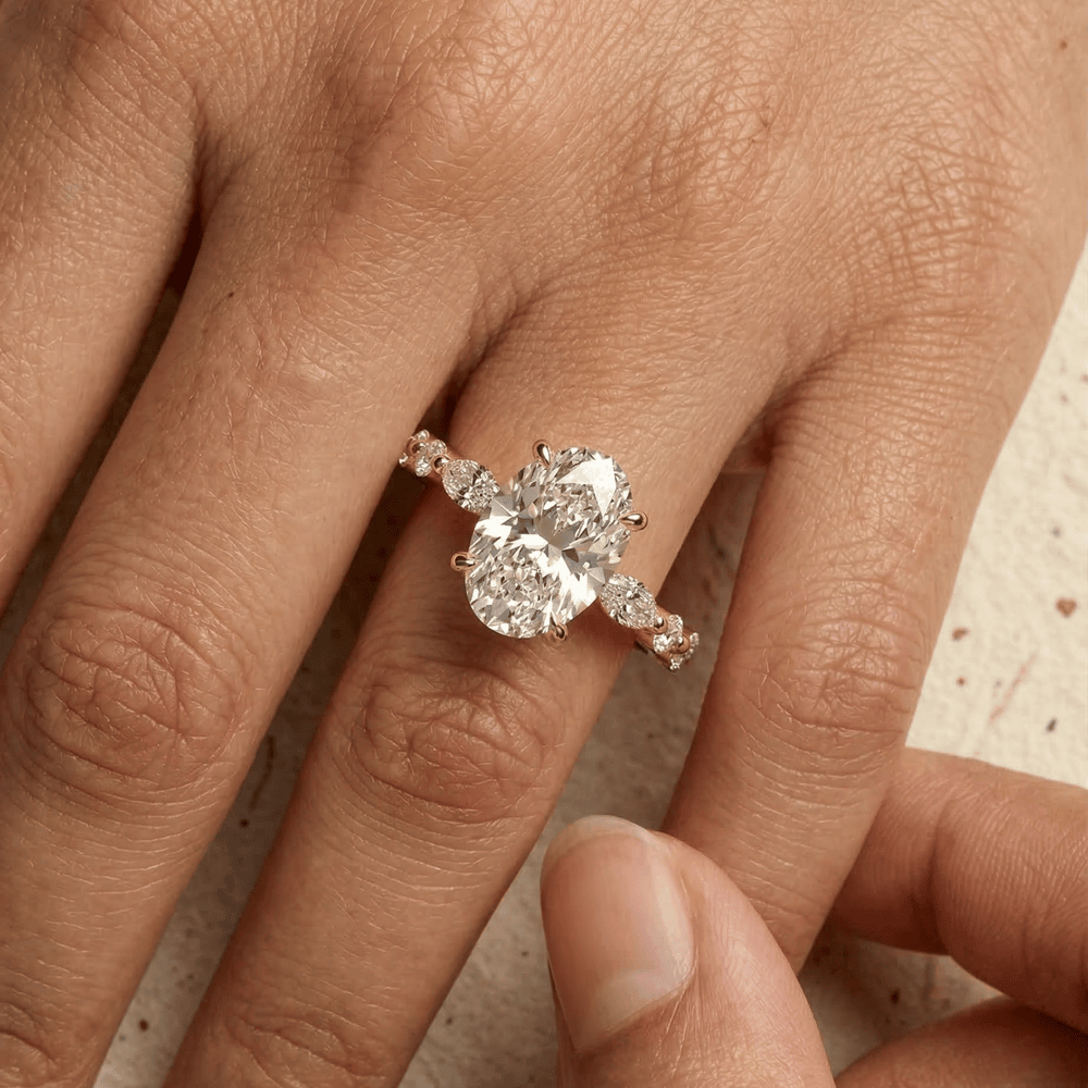 Elegant oval moissanite proposal ring with slim marquise band