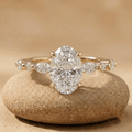 Oval moissanite solitaire engagement ring with side stones