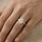 Oval solitaire wedding ring with brilliant side stones