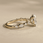 Oval moissanite engagement ring with sparkling side stones