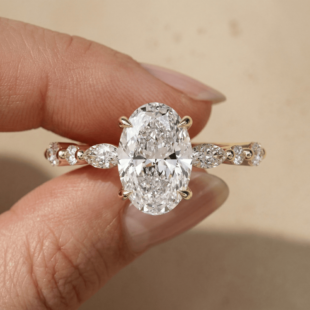 Oval cut moissanite ring with delicate moissanite accents