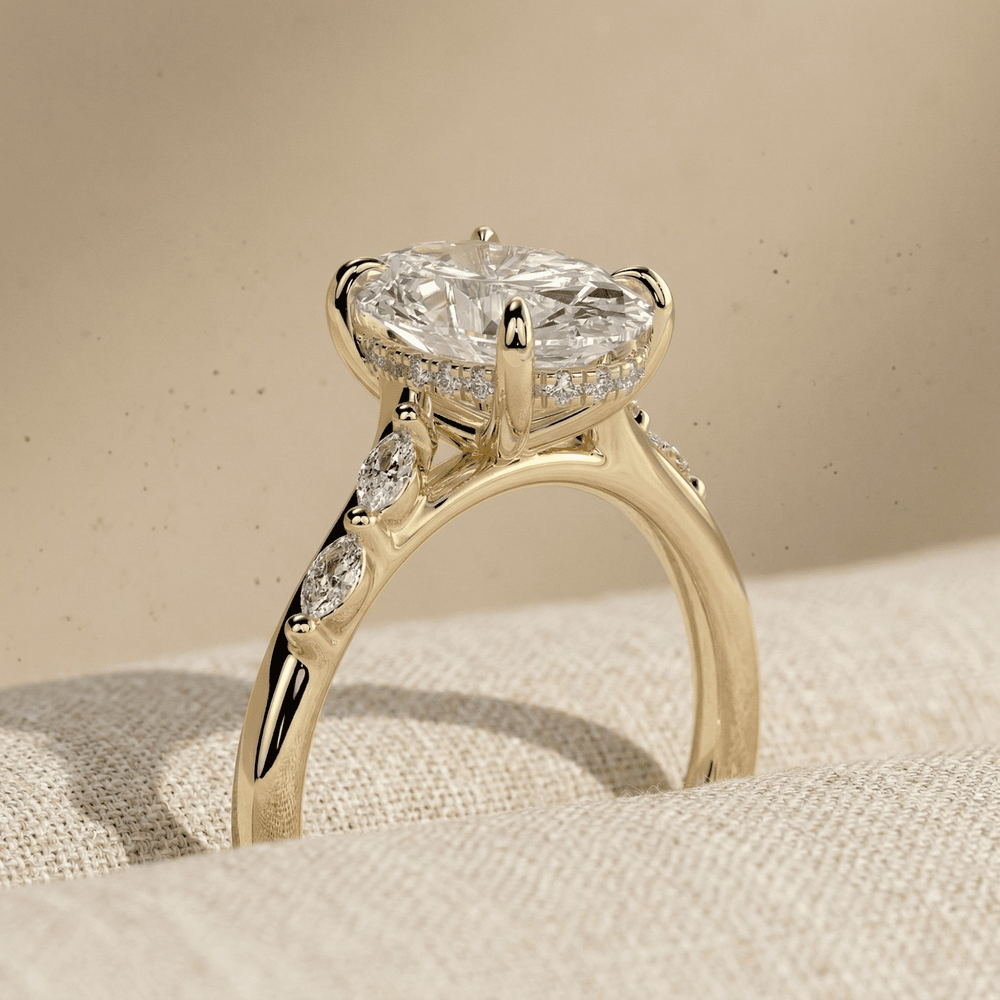 Oval cut moissanite solitaire ring with hidden halo