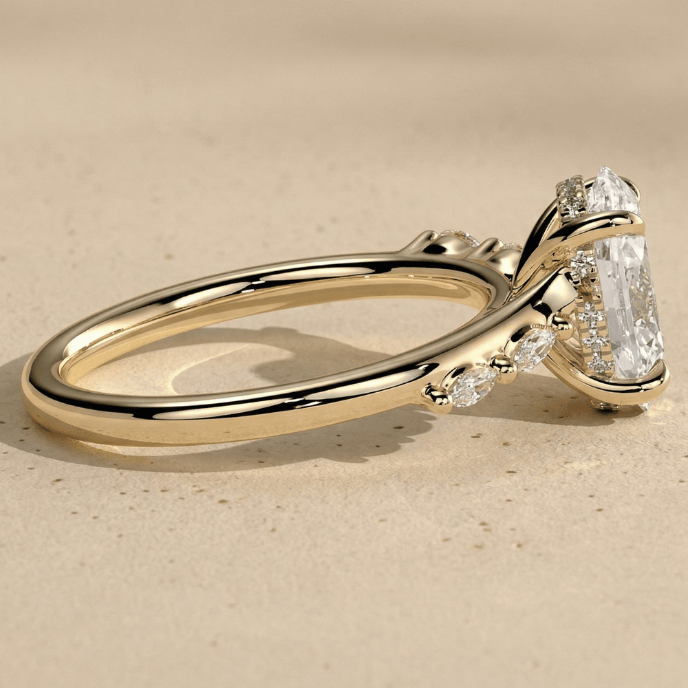Hidden halo oval moissanite engagement ring in yellow gold