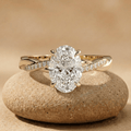 Oval solitaire moissanite hidden halo twisted wedding ring