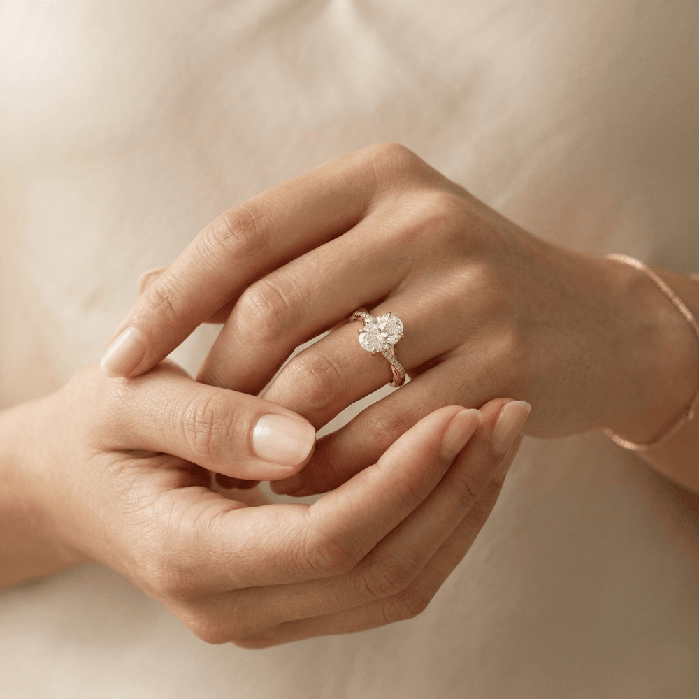 Modern oval solitaire engagement ring for her