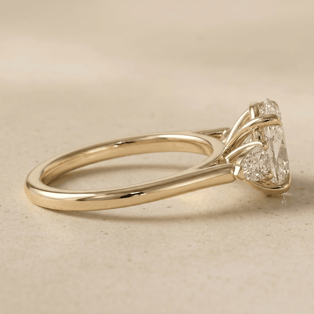 Oval moissanite cathedral engagement ring side view
