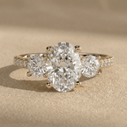 14K gold oval moissanite engagement ring with sparkling band