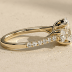 Oval moissanite bridal ring with two side stones