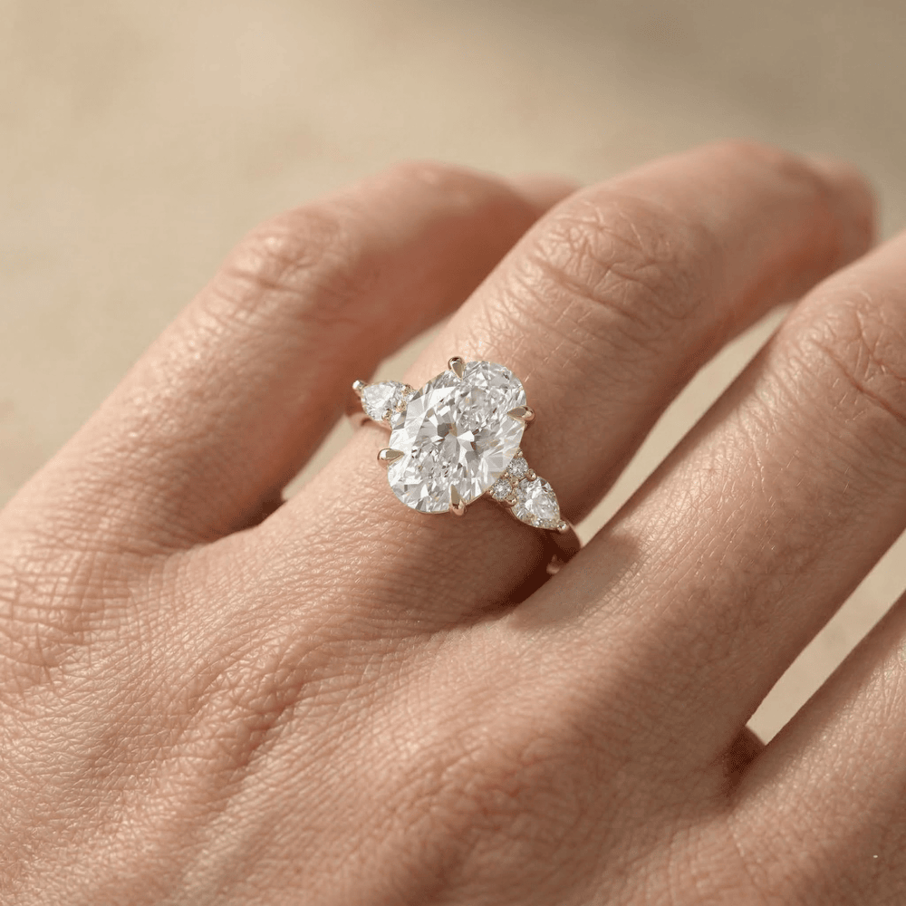 Oval center stone gold bridal engagement ring