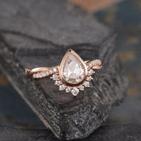 Pear Cut 1.50CT Bezel Set Diamond Rose Gold Intertwined Moissanite Engagement Wedding Ring Set - JBR Jeweler