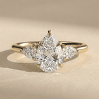 Three Stone Pear Moissanite Engagement Ring in Gold