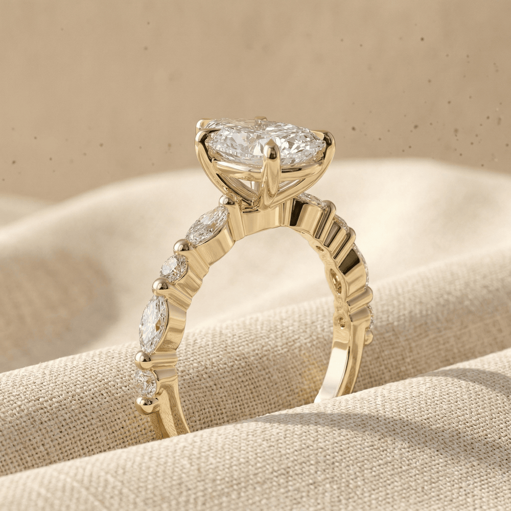 14K gold pear moissanite bridal ring with sparkling side stones