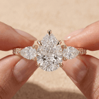 Pear cut moissanite three stone engagement ring for women