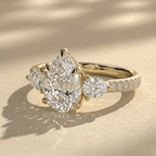 Pear shaped moissanite cathedral bridal engagement ring