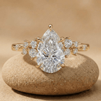 Pear moissanite cluster engagement ring in 14K gold