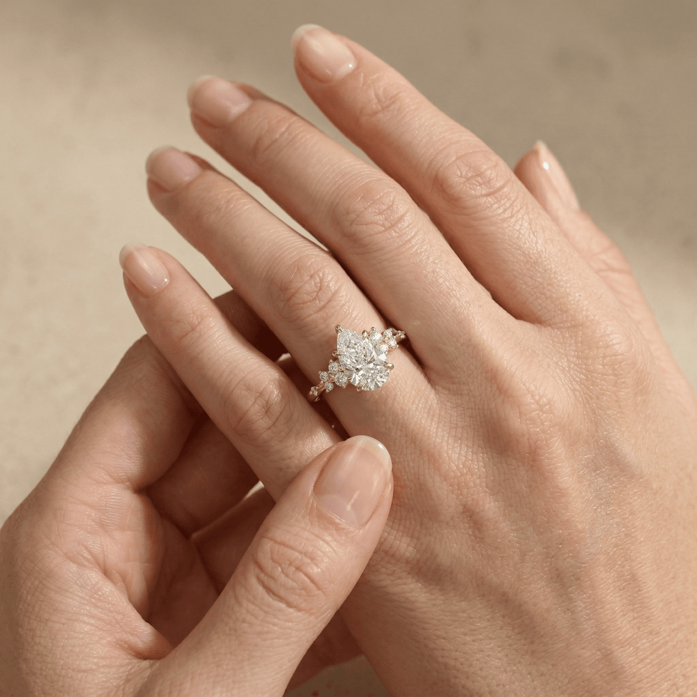 Elegant pear shaped moissanite ring for her
