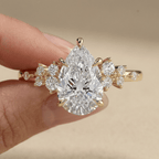 Pear shaped moissanite cluster ring for marriage proposal