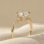 Pear moissanite cluster bridal ring with sparkling accent stones