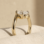 Pear moissanite bypass engagement ring in solid 18K gold