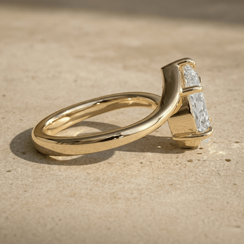 18K gold pear cut moissanite solitaire ring side view