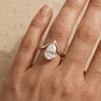 Pear solitaire moissanite wedding ring close up