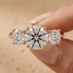 Three stone moissanite engagement ring close up