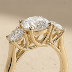 Round moissanite three stone gold engagement ring design
