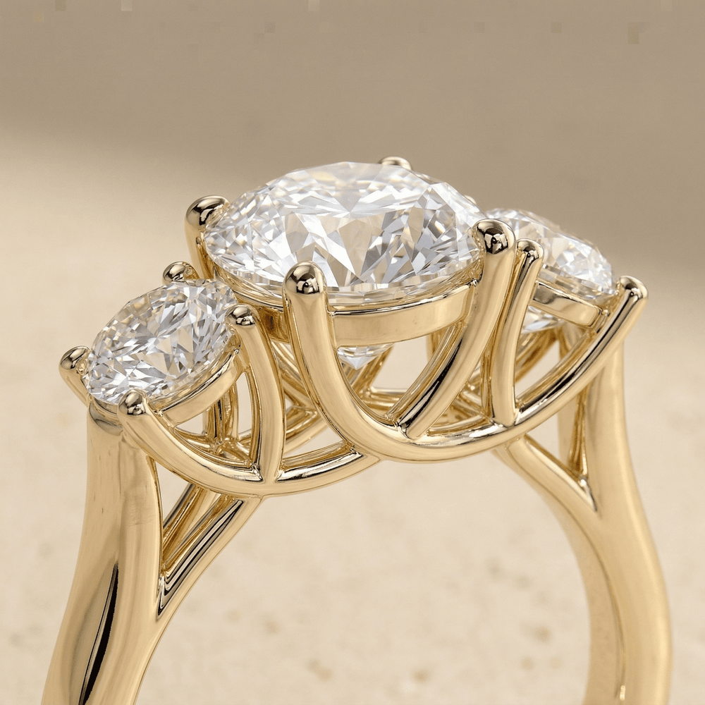 Round moissanite three stone gold engagement ring design