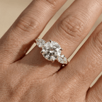 Minimalist three stone moissanite ring