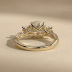 Round moissanite bridal ring with twisted band