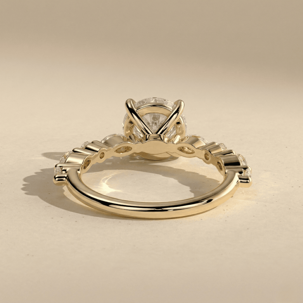 Round moissanite bridal ring in 10K yellow gold setting