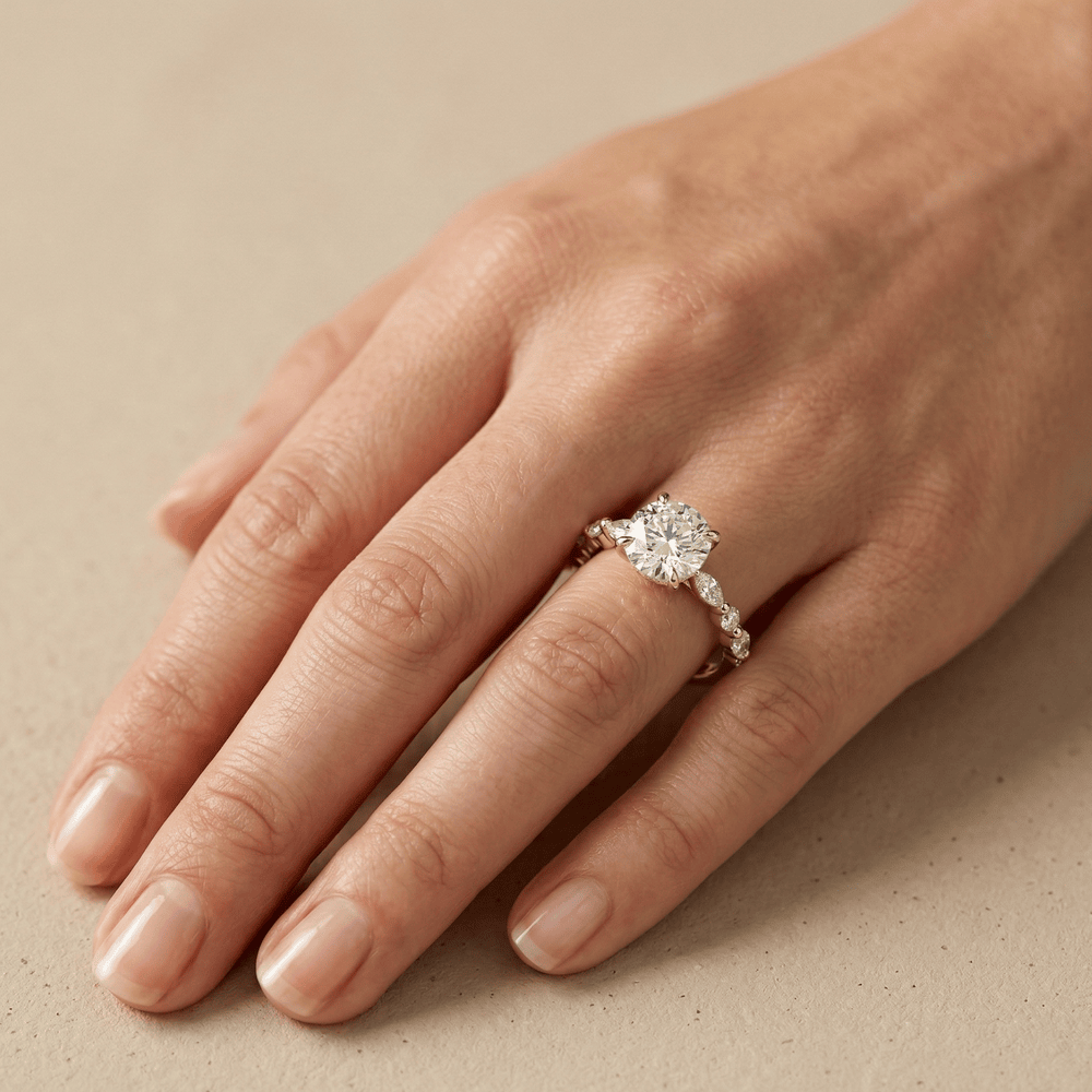 Yellow gold engagement ring with round moissanite center