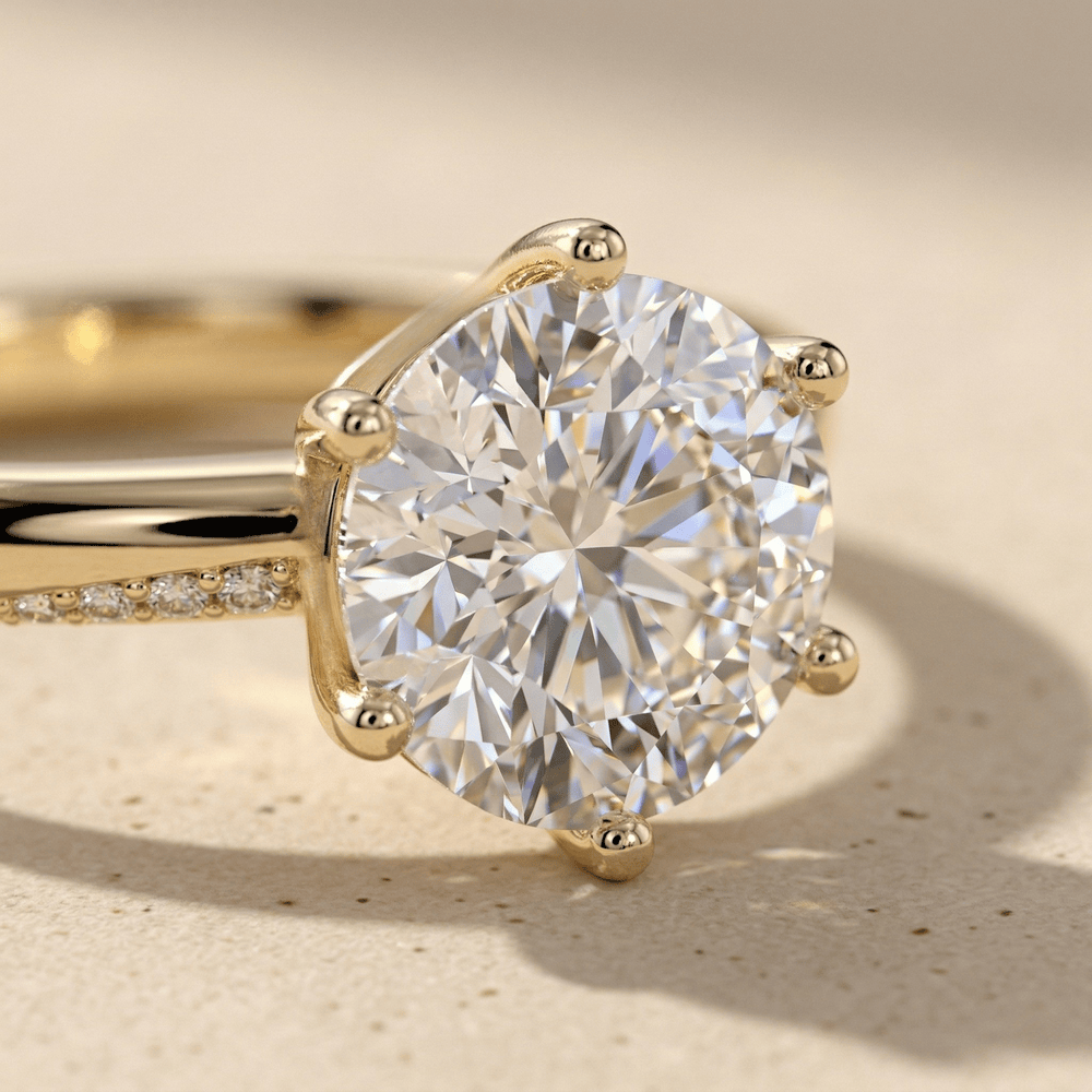 Sweeping micropavé moissanite ring in 14K gold close up view