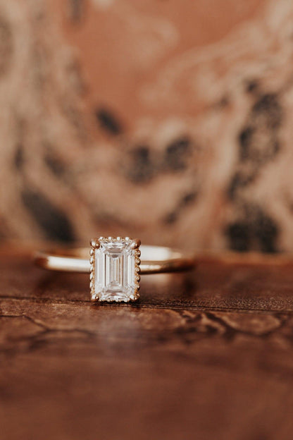 The Charlotte Emerald Cut Beaded Head Solitaire - JBR Jeweler