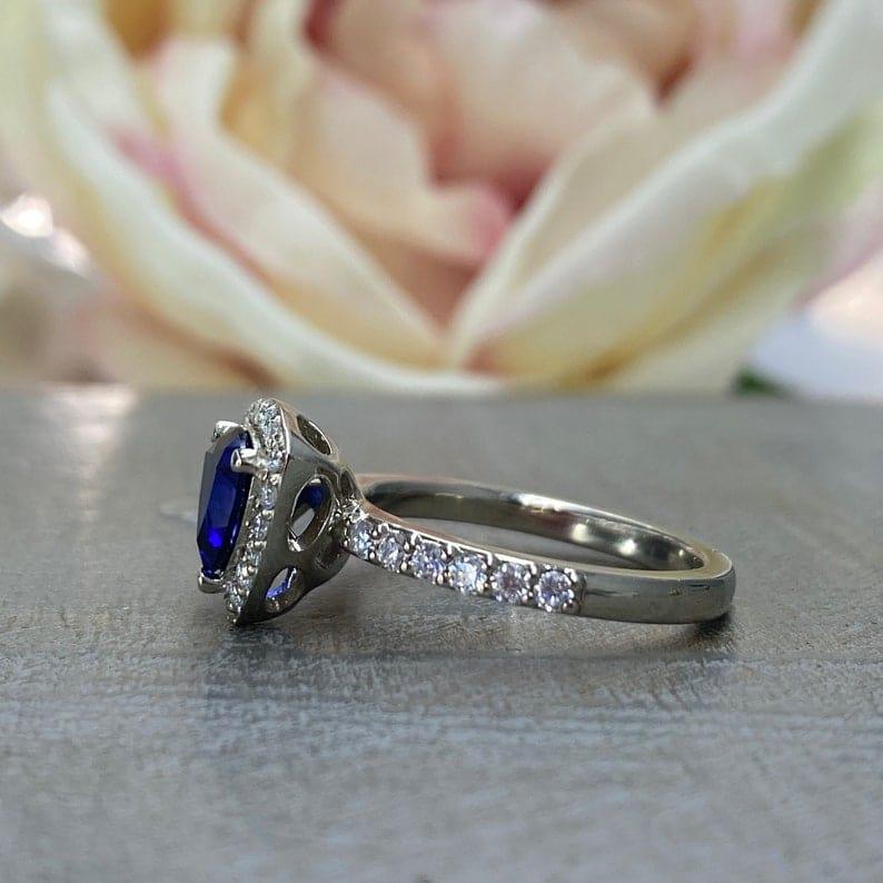 Triangle clearance sapphire ring